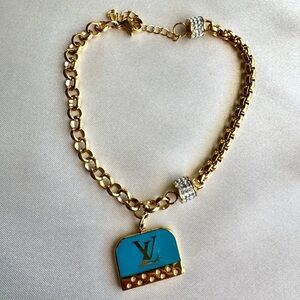 Luxurious Gold Bracelet with Blue Charm